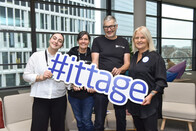 Das Kernteam der IT-Tage präsentiert den berühmten Ittage-Hashtag.